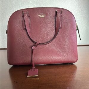 Kate Spade Red Satchel with Elegant Gold Accents